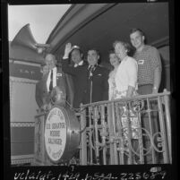 Senator Pierre Salinger with family and actor Dan Blocker on his Whistle Stop campaign train in Los Angeles, Calif., 1964