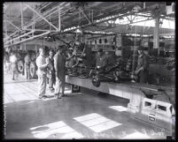 Workers on the assembly line at Ford Motor plant, Long Beach, 1930