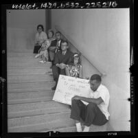 CURE demonstrators at chancery of Los Angeles Catholic Archdiocese in protest against Cardinal McIntyre, 1964