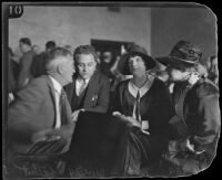 Roland Woolley, William I. Gilbert, Aimee Semple McPherson, and Minnie Kennedy in court, Los Angeles County, 1926