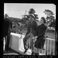 Bing and Kathy Crosby on the terrace of the Del Monte Lodge, Pebble Beach during 29th annual Pro-Am Clambake, 1970