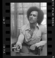 Huey P. Newton speaking with cigar in hand, 1977