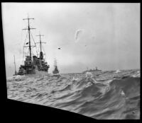 Three Navy cruisers steam through the water, Southern California, 1933