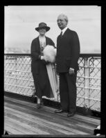 USC President Dr. Rufus von Kleinsmid and his wife Elisabeth on board a ship, San Pedro, 1923-1932