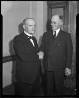 P. P. O'Brien and Henry B. R. Briggs, past and present postmasters, shaking hands, Los Angeles, 1943