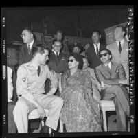 Elvis Presley entertains King Mehendra and Queen Ratna of Nepal on a movie set in Los Angeles, Calif., 1960