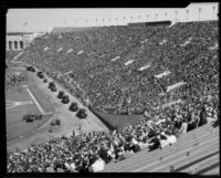 Military vehicles in parade at President's Day Ceremony, Los Angeles Memorial Coliseum, Los Angeles, 1933