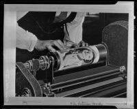 Photographic wrapped around a cylinder on a Wirephoto machine, Los Angeles, 1935