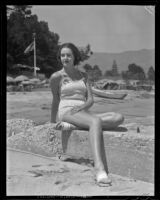 Adeline McCormick poses at the shore of a lake, Southern California, 1936