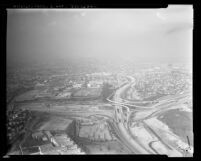 Aerial view of construction on San Bernardino Freeway near California State University Los Angeles, 1972