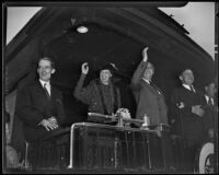 President Roosevelt and Mrs. Roosevelt waving good-bye from the train at Central Station, Los Angeles, 1935