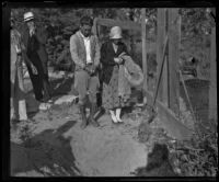 Confessed murderers Koji Hatamoto and Ayako Kanda standing over the grave of Molly Kanda, Torrance, 1932