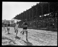 Runners race during the Pacific Fleet championship track meet, Long Beach, 1922