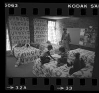 Children's Village USA director Curt Sugiyama with two boys in Beaumont, Calif., 1980