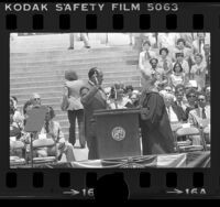 Mayor Tom Bradley taking oath of office from Chief Justice Rose Bird in Los Angeles, Calif., 1977