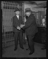 Confessed murderer John H. Happel handcuffed in jail, Los Angeles, 1934