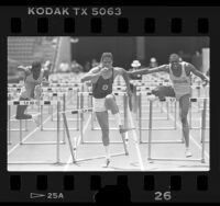 Robert Reading, Kevin Young and Derek Knight racing hurdles in Los Angeles, Calif., 1986