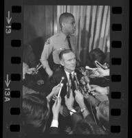 Jack Kirschke talking to journalists at the time of his murder trial, Los Angeles, 1967