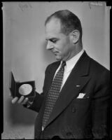 James Harold Doolittle with the medal awarded to Will Rogers, Santa Monica, 1935