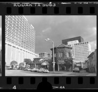 High-rise buildings surrounding Acapulco restaurant and Haagen-Dazs shop on Kinross Ave and Glendon in Westwood, Calif., 1986