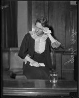 Gladys Carter wipes away tears as she fights for custody of her daughter, Los Angeles, 1935