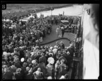 Commander Richard E. Byrd is greeted by a large crowd as he arrives at ...