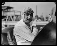 Pete Kreis driving race car number 15 on a race track, 1925-1934