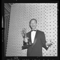 Don Knotts appears surprised as he receives award for Andy Griffith Show in Los Angeles, Calif., 1961