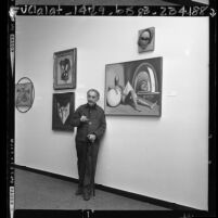 Man Ray at his LACMA exhibition, 1966