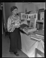 Frances Steloff, bookseller, with her collection at the Biltmore Hotel, Los Angeles, 1935