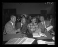 John True, state witness at the Monahan murder trial, with Dep. Dist. Atty. J. Miller Leavy and 2 other attorneys, Los Angeles, 1953