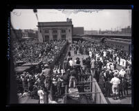 Crowd at train station waiting for Aimee Semple McPherson's arrival from Douglas Arizona, Los Angeles, 1926