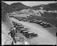 Four men work on widening the road through Griffith Park, Los Angeles, 1933