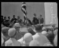 Australian aviator Sir Charles Kingsford-Smith addressing a crowd at Western Air Express Terminal, Alhambra, 1930