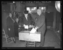 California Governor Frank Merriam and his wife casting ballots in Long Beach, Calif., 1938