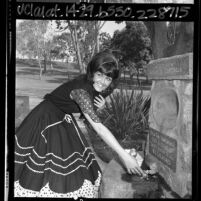 Woman at fountain of Aqua je de Centinela - Centinela Springs at Centinela Park, Inglewood, Calif., 1965