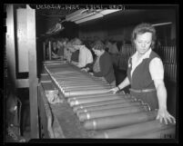 Women Ordinance Workers inspecting cartridge cases in Los Angeles, Calif., 1943