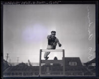 Otto Anderson soars over a hurdle, Los Angeles, 1922-1926