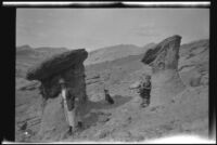 Sightseers at rock formations in Red Rock Canyon State Park, California, circa 1920-1930