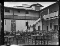 Restaurant Del Paseo tables in the El Paseo courtyard, Santa Barbara, [1930s?]