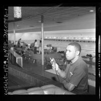 Former football player, Woodley Lewis inside his Sportsman's Bowl bowling alley in Los Angeles, Calif., 1962