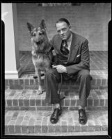 Dr. Boyd S. Gardner sits on a step with a dog, Beverly Hills, 1935