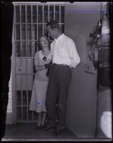David Clark with his wife, Nancy, outside of his cell during his murder trial, Los Angeles, 1931