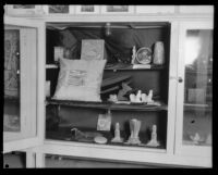 Cabinet of objects on display at the Los Angeles County Fair, Pomona, 1929