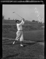 Professional golfer Charlie Guest swings his driver, 1924-1938