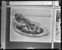 Whole cooked tongue on a platter, 1936