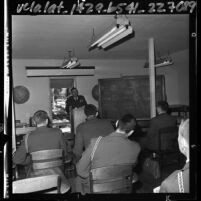 Robert E. Schellhous conducting ROTC class in air science at University of Southern California, 1964