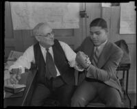 Joe Lewis and Harry Carr arm wrestling, Los Angeles, copy print 1936