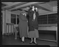 Katherine Haywood and Betty Barnes hide their faces, Los Angeles, 1935