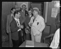 John Moore speaking with Lou Daro after the death of William Focher, Los Angeles, 1935